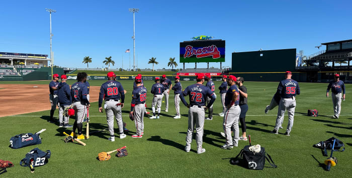 Atlanta Braves gather on the field before starting their spring training workout on Tuesday, Feb. 20, 2024 at CoolToday Park in North Port, Florida.